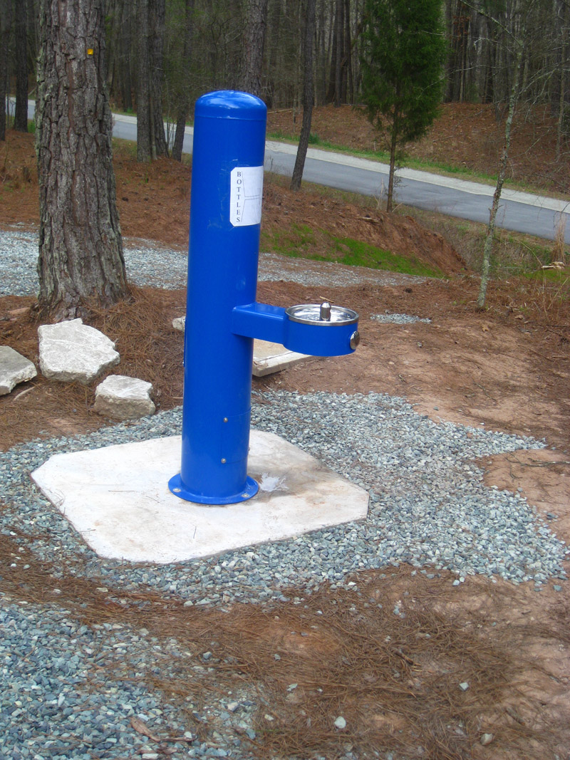 Water fountain on pad at Pittard Sears lot on the ATT